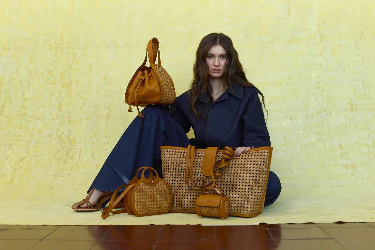 Spring Summer 2027: tan solihiya bags and navy tailoring