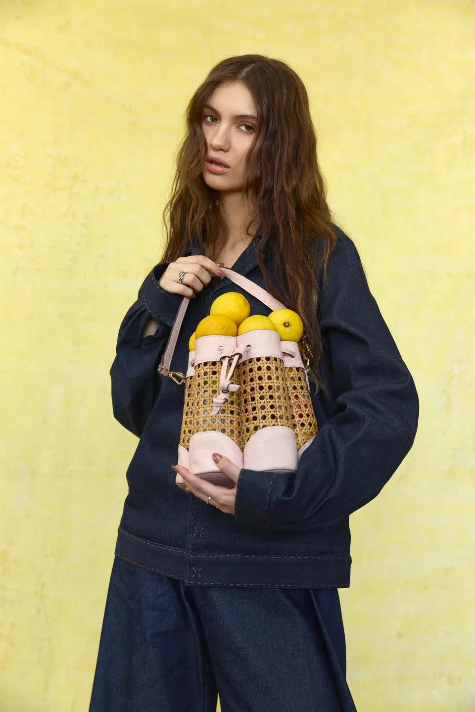 Spring Summer 2027: Closer view of the lilac bucket construction and handles