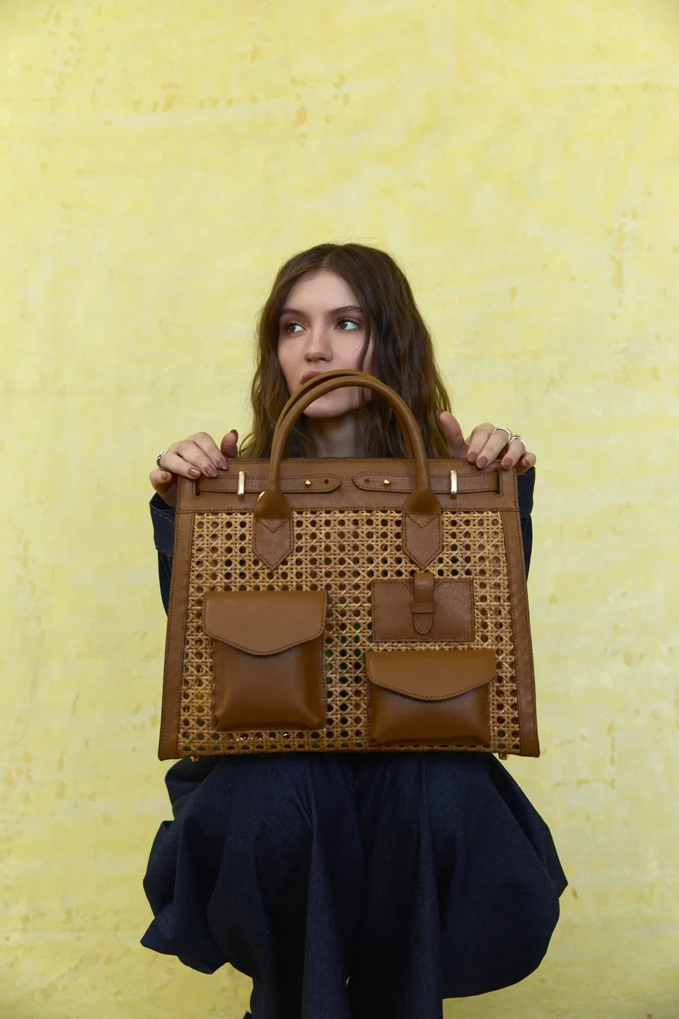 Spring Summer 2027: Woven briefcase and handle detail